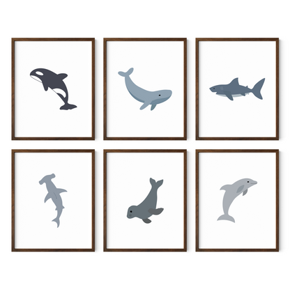 Blue and gray ocean animal art prints in walnut wood frames