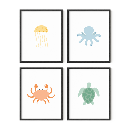 Four framed illustrations of a jellyfish, octopus, crab, and turtle