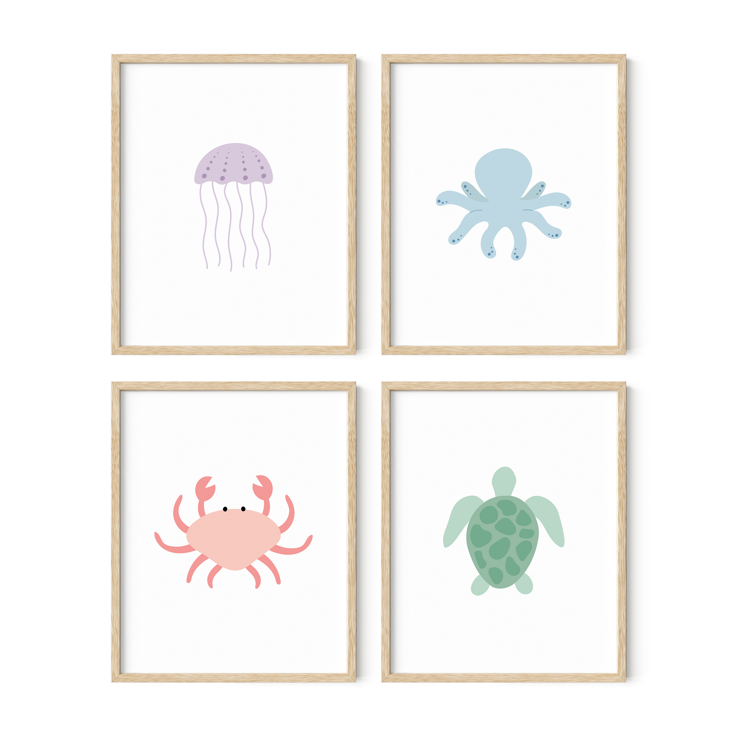 Four framed illustrations of sea animals in light wood frames