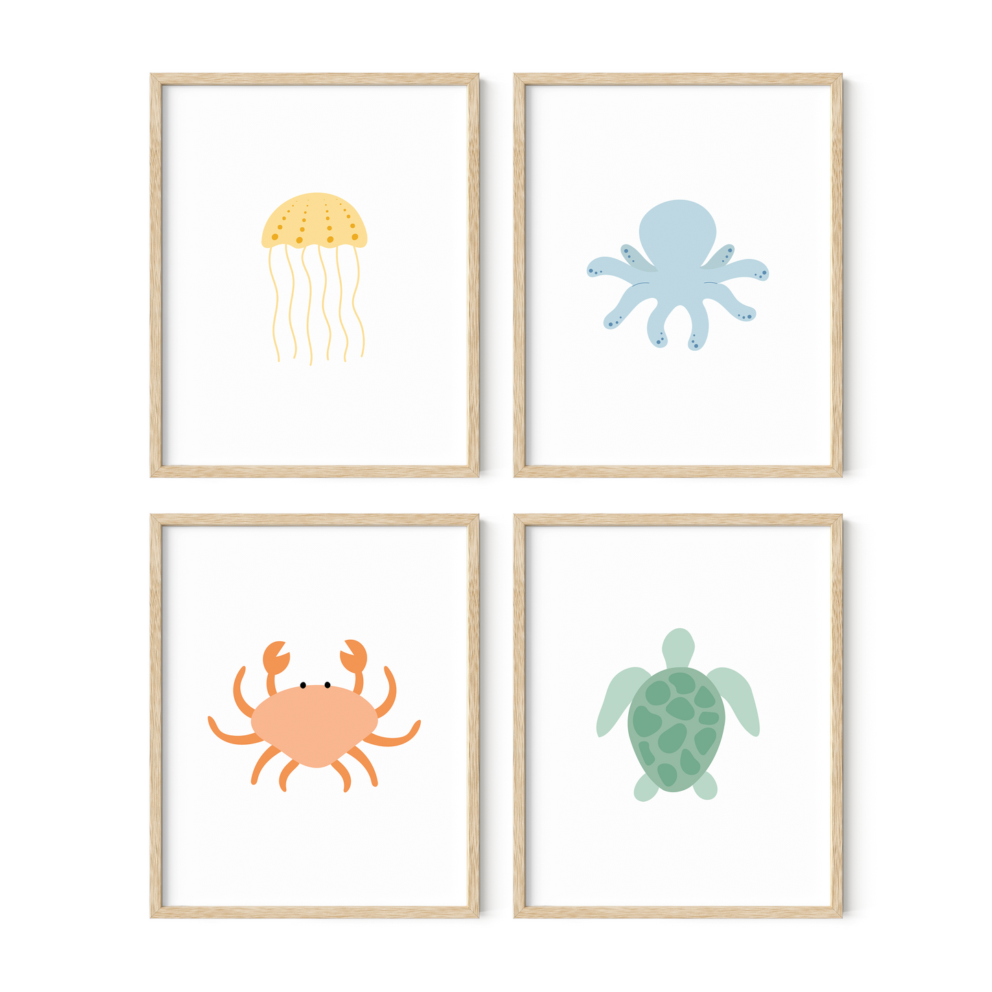 Ocean themed nursery art set of four in light wood frames
