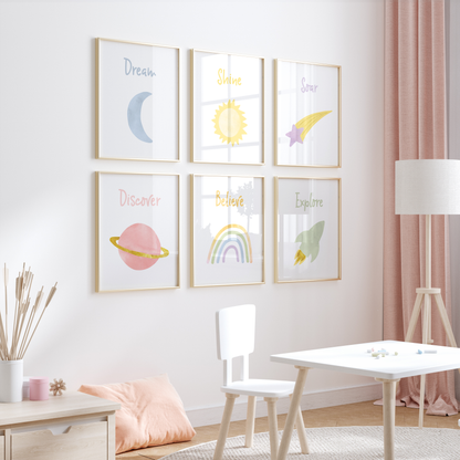 Space wall art in girl's room with pink curtains