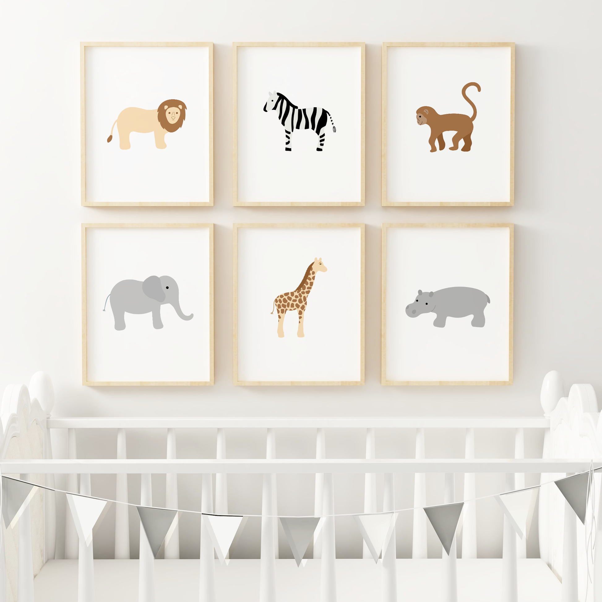 Jungle decor in nursery above crib