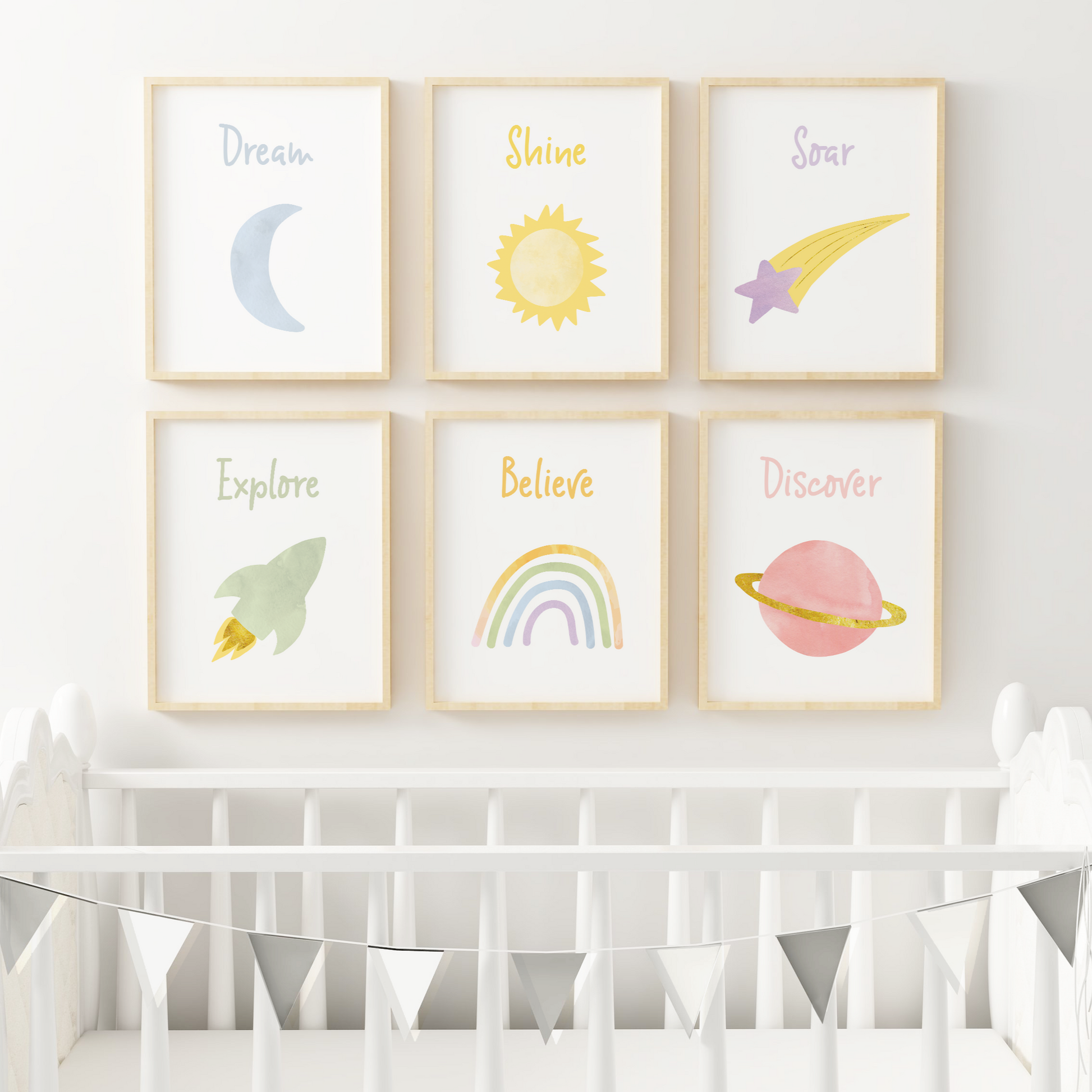 Star and moon wall art in nursery above crib